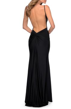 Liquid shine flows down this sultry gown, pausing only to frame your divine décolletage, beautiful back and shapely skirt before pooling at the hemline. Style Name:La Femme Open Back Jersey Trumpet Gown. Style Number: 5961578. Formal Pre-draped Backless Evening Dress, Stretch Backless Dress With Ruched Back For Evening, Maxi Dress With Closed Back For Evening, Maxi Dress With Back Opening For Evening, Stretch Maxi Dress With Low Back For Evening, Evening Backless Dress With Ruched Low Back, Formal Backless Evening Dress With Ruched Back, Evening Fitted Backless Dress With Sweep Train, Floor-length Evening Dress With Flattering Silhouette For Prom