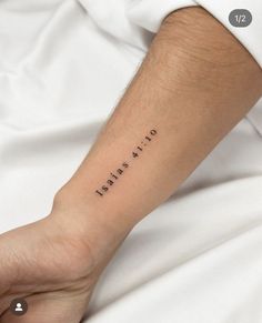 a person with a small tattoo on their wrist