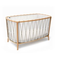 All round and translucent, the KIMI is an evolving bed, perfect for babies from 6 months up to 5 years old. 47.2" x 23.6" Designed without bars, this new bed is a reassuring cocoon which still allows the baby to see the world around him. Moreover, it prevents baby from injuring himself by trapping his leg or arm. This is a unique baby bed, as opposed to a crib, as the mattress does not raise. When the child is ready to sleep in a toddler bed, the KIMI can be turned into an open bed; once your ki Organic Cotton Blanket, Crane Design, Cotton Mattress, Natural Mattress, Bed Dimensions, Mattress Dimensions, Bed Base, Black Bedding, New Beds