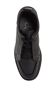 An inverted apron toe brings modern appeal to a calfskin leather sneaker with a logo-marked red sole that oversteps its bounds and colors the inner sidewall. Lace-up style Wipe with a soft, dry cloth and store in a dust bag Removable insole Leather upper and lining/synthetic sole Made in Italy Designer Shoes Red Sole, Fabric Gift Bags, Christian Louboutin Shoes, Up Styles, Leather Sneakers, Calf Skin, Designer Shoes, Leather Bag, Christian Louboutin