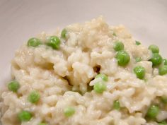 rice and peas are mixed together in a bowl