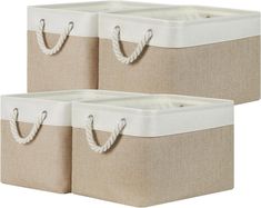 two canvas storage baskets with handles and rope handles, one beige and the other white