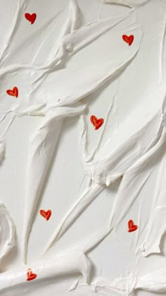 the paint is white with red hearts on it