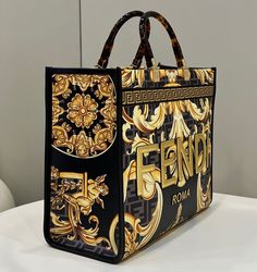 Size: 35 x 31 x 17 cm Detachable and adjustable shoulder strap Includes Shipping bags, dust bag sleeper, care manual, booklet, tag Fendi Print, Versace Baroque, Baroque Print, Ff Logo, Fabric Black, Medium Tote, Sierra Leone, Fendi Bags, Tortoise Shell