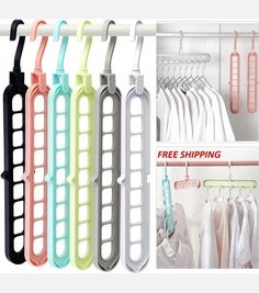 the clothes hangers are organized in different colors