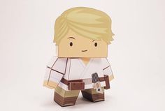 an origami star wars character is holding a guitar and wearing a white shirt