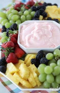 fruit platter with dip and berries on the side