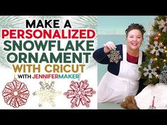 a woman in an apron is next to a christmas tree and snowflake ornaments