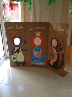 three children's books on display in front of a door with the words santa teresa de dineco