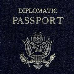 an american passport with the seal of the united states in white on a black background