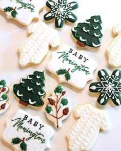 many decorated cookies are arranged on a table with the words happy christmas written on them