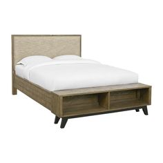 the bed is made and has two drawers on each side, along with white sheets