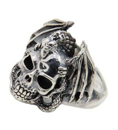 If you love the wild flying beasts then you are in the right place! this skull is attacked by a flying beast ! it is ideal for unique outfits, you should add this silver skull ring in your collection! Sterling Silver : 925 Sterling Silver (100% Pure) No form of discomfort on your skin Neat details STANDARD SHIPPING OFFERED ☠️ Refer to our MEASURING GUIDE if you're not sure what size to order.. ☠️👉Discover our collection Skull Rings Satanic Star, Flying Beast, Imaginary Creatures, Bat Skull, Small Nose, Skull Rings, Skeleton Head, Silver Skull Ring