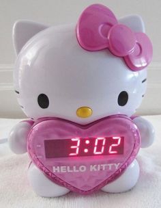 the hello kitty alarm clock is on display