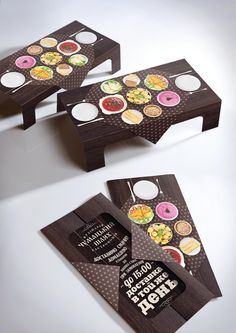 two tables with different types of food on them