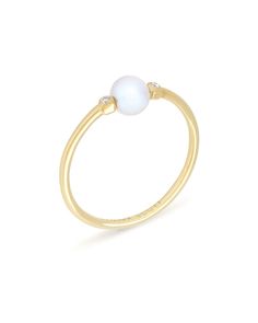 The Cathleen 14k Yellow Gold Band Ring in Pearl is stunningly simple, and a staple piece for any wardrobe. This 14k Yellow Gold band ring features one of our pearls on an understated setting with two petite diamonds that complete the look. The Cathleen 14k Yellow Gold Band Ring is a piece that will live happily in your collection forever. 

Our diamonds are conflict-free in compliance with the Kimberley Process. Pearl Images, Buy Earrings Online, Gold Pearl Ring, Buy Earrings, Gold Band Ring, Affordable Jewelry, Pearl Diamond, Online Earrings, Pearl Size