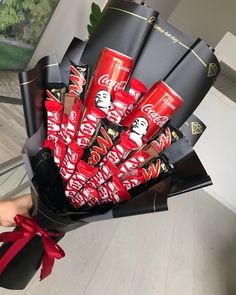 a bouquet of chocolates wrapped in black paper