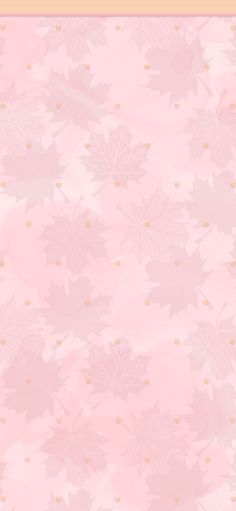 a pink background with lots of leaves on it