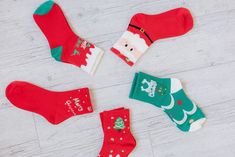 Step up your sock game this holiday season with these 5Pcs Christmas Cartoon Print Socks. These festive and quirky socks will add a touch of playfulness to any outfit. With their fun prints, they are sure to make you stand out from the crowd. Perfect for spreading holiday cheer! Model Info: Models are 5'7", Size 2, wearing smalls Material: 100% Polyester Fun Christmas Gift Socks, Novelty Christmas Gift Socks, Novelty Winter Socks For Gifts, Novelty Winter Socks For Gift, Novelty Winter Socks As Gift, Novelty Socks For Winter Gift, Red Novelty Socks For Winter, Novelty Red Socks For Winter, Fun Red Socks For Gifts