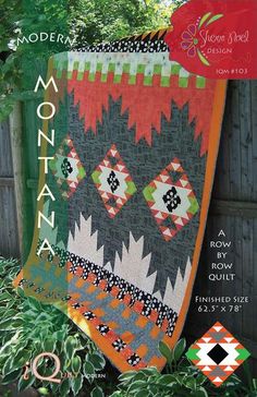 the cover of modern quilts magazine featuring an image of a black and orange blanket