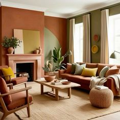 a living room filled with furniture and a fire place in front of a window on top of a rug