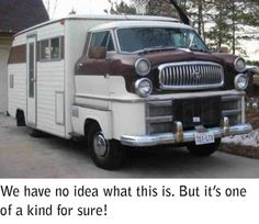 an old white and brown bus parked in front of a house