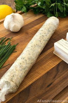 the ingredients to make an appetizer are laid out on a cutting board