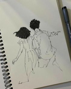 a drawing of two people standing next to each other on top of a white paper