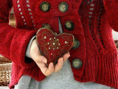 a woman holding a red heart in her hands with the caption, my heart has no more room for disappointmentment