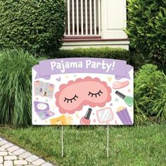 there is a sign that says pajama party in front of some bushes and trees