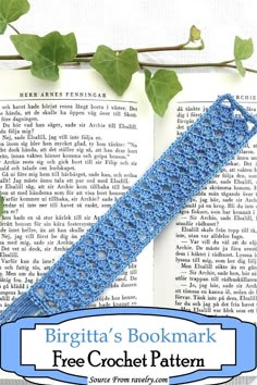 a crocheted bookmark is sitting on top of an open book with ivy