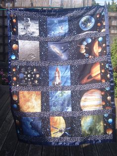 this is an image of a quilt made to look like the outer planets in space