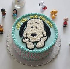 there is a cake with a dog on it