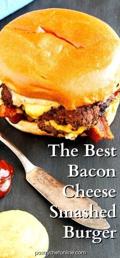 the best bacon cheese smashed burger with ketchup and mustard is ready to be eaten