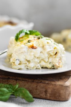 a close up of a plate of food with broccoli and cheese on it