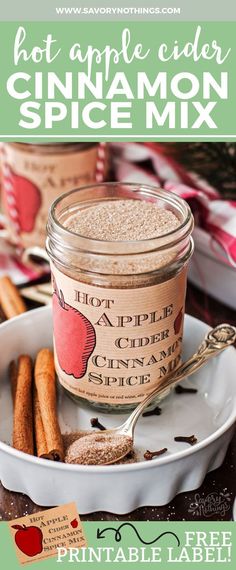 hot apple cider cinnamon spice mix in a glass jar with spoon on the side