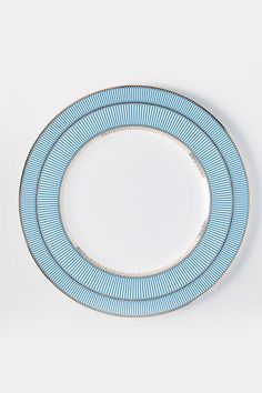 These charger plates will be the statement of your table! Rendered in deep blue & gold, embellished with stripes, these will transform your meal into a royal gala. Layer with our 5 pc. dinner set and your dining table will be the envy of your guests. Trimmed with a 22k gold hand embossed rim. Dishwasher safe. 13" Navy Charger Plates, Blue Charger Plates, Gold Fluted Charger Plate, Agate Charger Plates, Gold Trim Dinner Plates, Royal Gala, Charger Plate, Dinner Set, Gold Hand