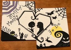 two coasters decorated with black and white designs