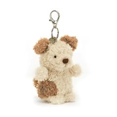 a teddy bear keychain is shown on a white background