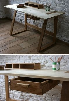 this desk is made out of wood and has two drawers on the bottom, one with an open drawer underneath it