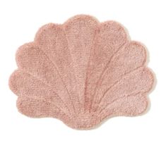 a pink bath mat with an open shell design on the front and back of it