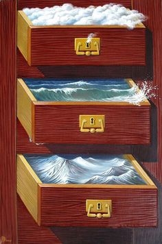 three drawers with locks on them in front of the ocean and wave crashing behind them