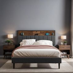 a large bed sitting next to two nightstands in a bedroom