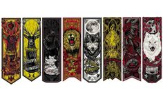 an assortment of different colored and black and white banners with wolfs, lions, and other animals on them