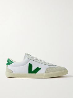 Veja's 'Volley' sneakers take cues from popular styles from the '70s. Made from canvas, they're trimmed with smooth suede and leather and feature the iconic 'V' logos at the center. The padded collars and tongue ensure a comfortable fit. Veja Volley, Veja Women, Swimsuit Jewelry, Veja Shoes, Veja Sneakers, Raffia Bag, Popular Styles, Women Sneakers, Matthew Williamson