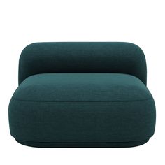 a green couch sitting on top of a white floor