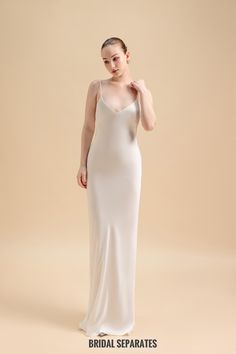 Handmade silk crepe by yours truly. Color :  Light Ivory Details:  Well-constructed double layer crepe silk Spaghetti straps  Deep V back matching the overlay back  Floor length  Zipper closing If you choose custom size, I will message you measurements guide later Shop other BRIDAL DRESSES : https://etsy.me/31l1Ipb Turnaround time: Due to the delicate nature of the handcrafted goods we produce this cover up has creation time of approximately 6-8 weeks  💕Exchange:  For items in standard sizes, I'm happy to accept exchange within 3 days of delivery. Buyers will be responsible for the new shipping fees.  For custom sizes, and custom orders, unfortunately I won't be able to accept exchange since they are made with your specific requirements.  💕Return:  For items in standard sizes, I'm happy Cream Silk V-neck Maxi Dress, Elegant Silk Dress With Spaghetti Straps For Wedding, Elegant Silk Wedding Dress With Spaghetti Straps, Cream Silk Slip Dress With Spaghetti Straps, Elegant Silk Slip Dress For Wedding Night, Elegant Modal Satin Wedding Slip Dress, Silk Maxi Dress With Satin Finish And Spaghetti Straps, White Silk Slip Dress With Satin Finish, Silk V-neck Slip Dress For Wedding