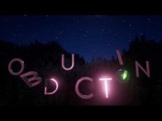 the words education written in neon lights against a night sky filled with stars and trees