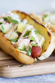 Hot dogs with Tex-Mex flair – this Mexican Hot Dog recipe gives you hot dogs topped with a chipotle mayonnaise, avocados, cheese and cilantro.