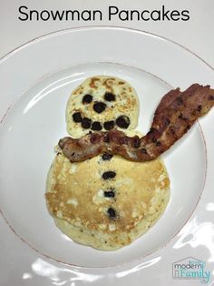 a plate with pancakes and bacon on it